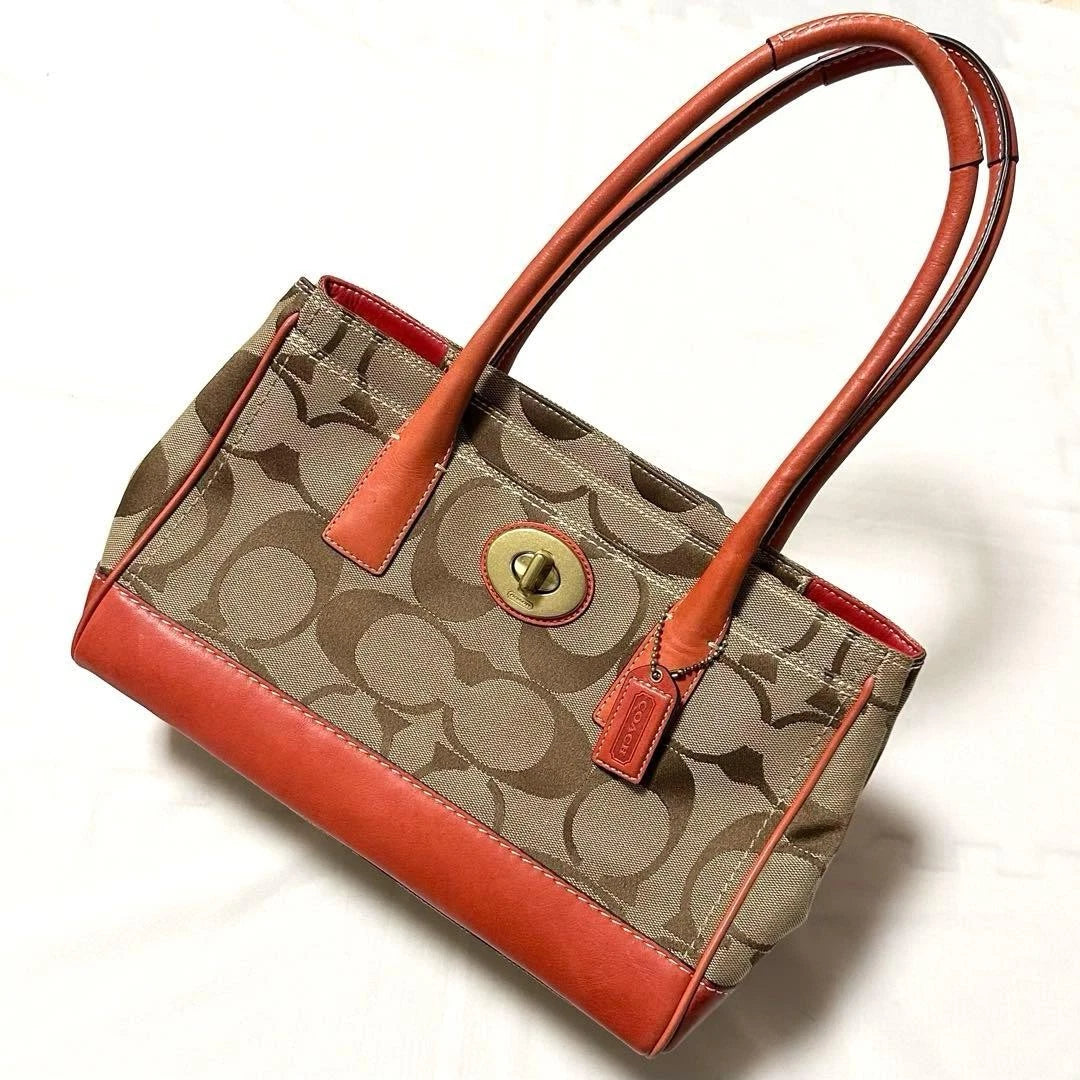 Coach Hampton Madeline Signature Canvas Satchel in Brown/Orange